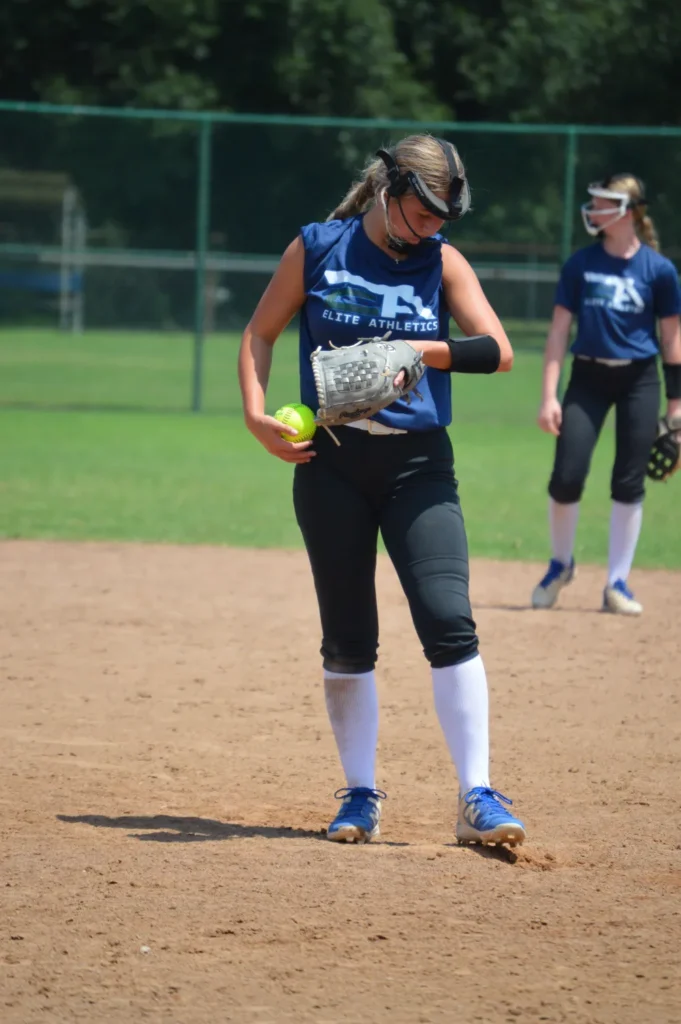 mattie checking wristband for pitch called