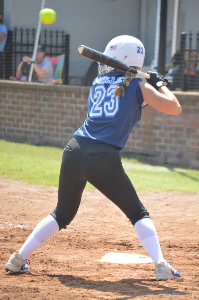 mattie millet at bat high pitched ball